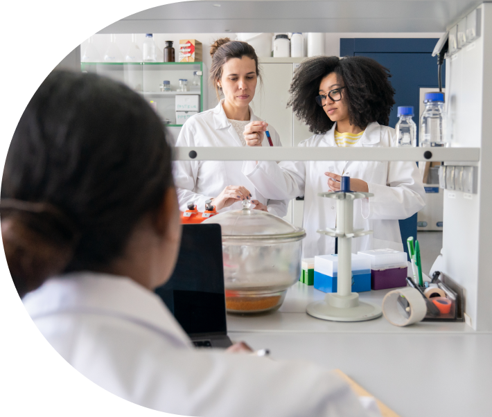 Three women in a lab using a single test to identify multiple infections at the same time